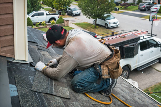 Professional Flat Roof Repair technician working in St Columbans, NE
